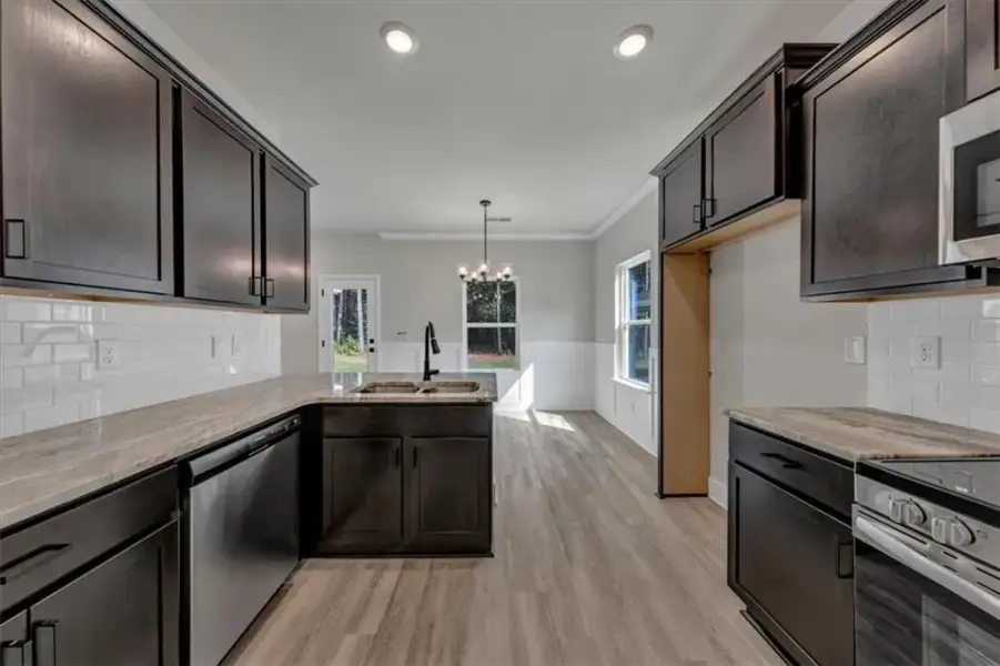 Furnished interior view inside a new home in Canterbury Villas, Carrollton (Image 9).
