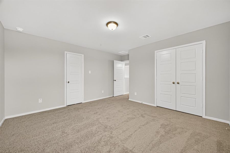 Spacious, unfurnished interior of a new home in Sunterra, Katy (Image 17).