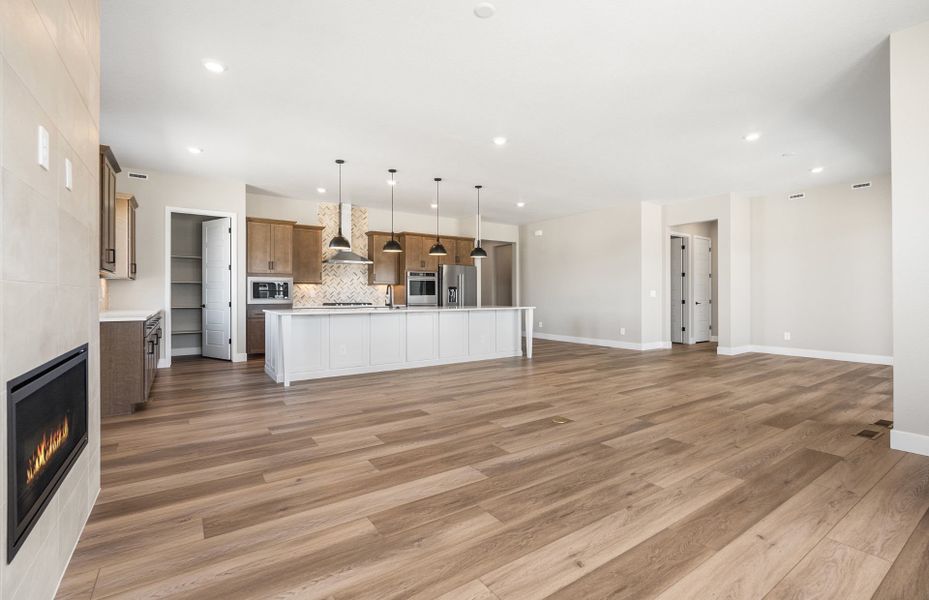 Furnished interior view inside a new home in Hilltop at Inspiration, Aurora (Image 6).
