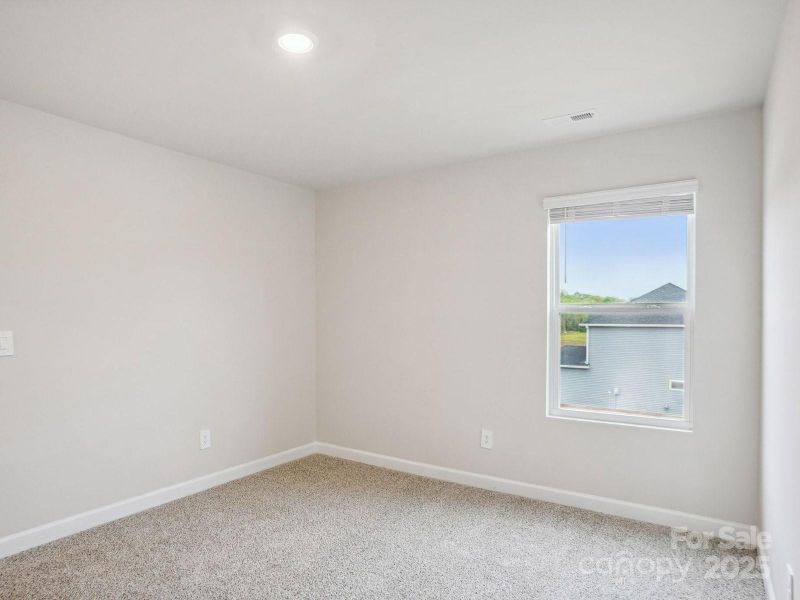 Photos are not of the actual home, but are photos of the builder home with same floorplan with similar interior finishes.