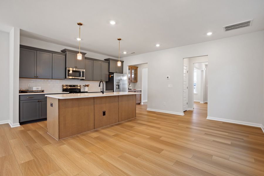 Furnished interior view inside a new home in Renaissance at White Oak, Garner (Image 8).