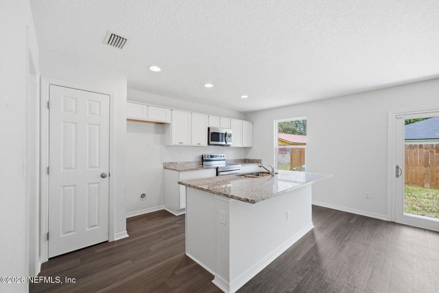 Furnished interior view inside a new home in , Jacksonville (Image 14).