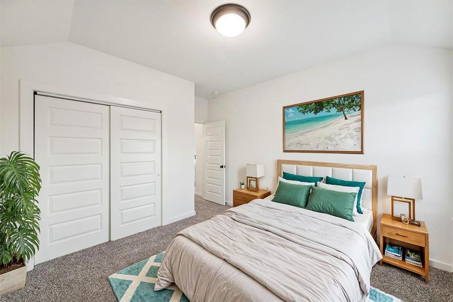 A spacious guest bedroom that combines simplicity with comfort. The soft tones and ample closet space make it a welcoming place for visitors or a perfect secondary bedroom.