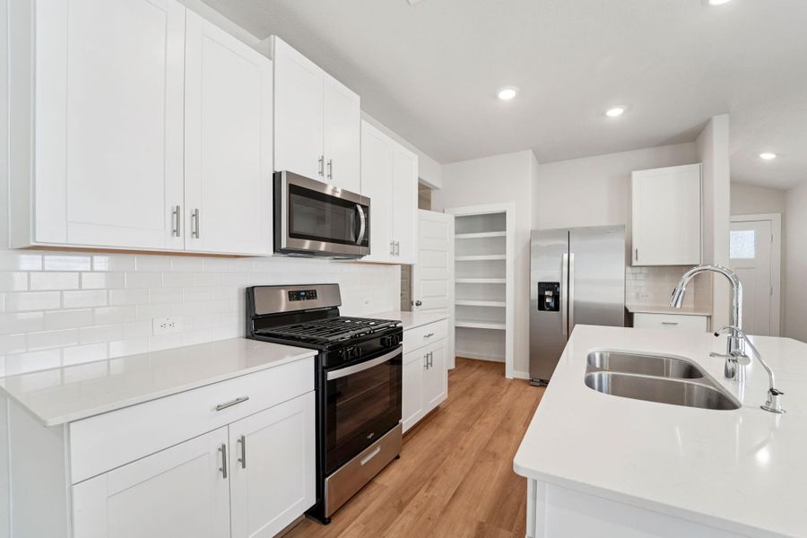 Photo is not of the actual home, but is an inspirational photo of builder’s model home and may depict options, furnishings, and/or decorator features that are not included