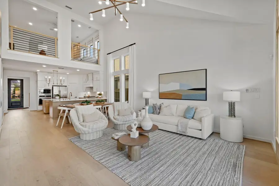 **RENDERING PHOTOS OF THE SAME FLOOR PLAN, FINISHES WILL DIFFER**