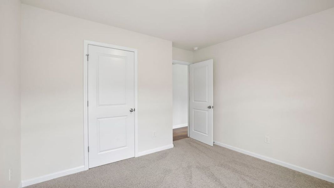 Spacious, unfurnished interior of a new home in Bentley Park, Greenwood (Image 27). Spacious, unfurnished interior of a new home in Bentley Park, Greenwood (Image 27).