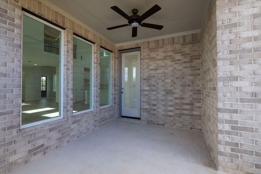 Exterior details and patio area of a home in Parmer Ranch - 40', Georgetown (Image 20).