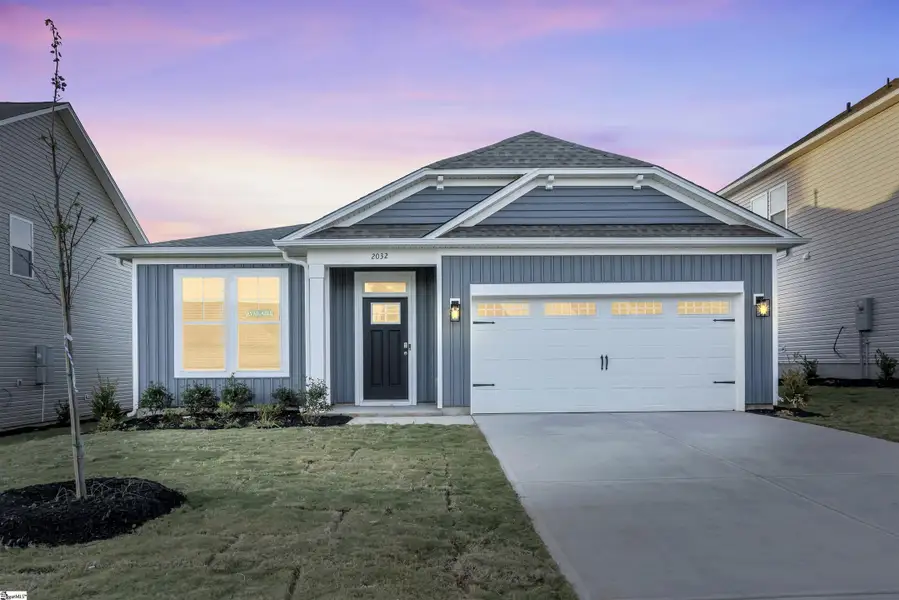 Front exterior of a new home in Halton Oaks, Spartanburg, SC, highlighting curb appeal (Image 1). Front exterior of a new home in Halton Oaks, Spartanburg, SC, highlighting curb appeal (Image 1).