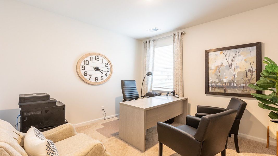 Furnished interior view inside a new home in Pine Hills at Cane Bay, Summerville (Image 18). Furnished interior view inside a new home in Pine Hills at Cane Bay, Summerville (Image 18).