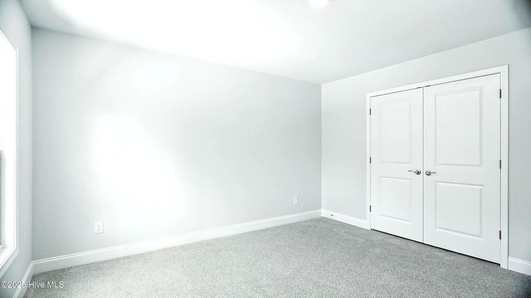 Spacious, unfurnished interior of a new home in Palmetto Creek, Bolivia (Image 12).