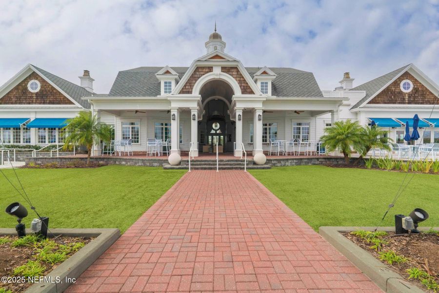Front exterior of a new home in Beacon Lake, St. Augustine, FL, highlighting curb appeal (Image 23).