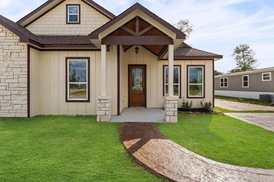 Exterior details and patio area of a home in , Huffman (Image 28).