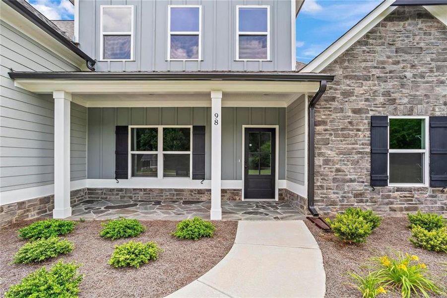 Front exterior of a new home in , Dallas, GA, highlighting curb appeal (Image 2). Front exterior of a new home in , Dallas, GA, highlighting curb appeal (Image 2).
