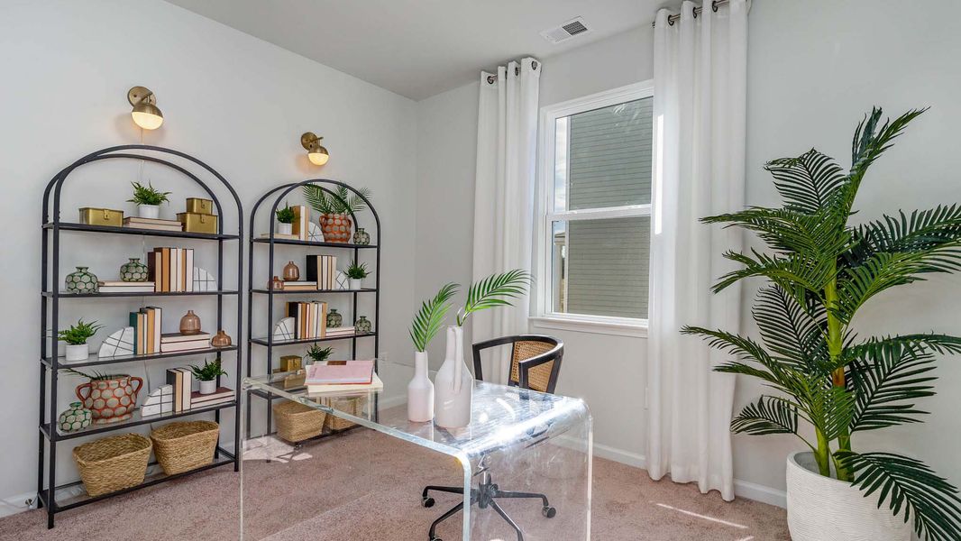 Representative furnished interior of a home built from the CALI by D.R. Horton in Sandridge Park, Little River (Image 7).