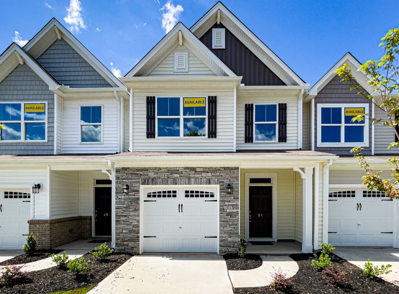 Front exterior of a new home in Fairview Village Townhomes, Simpsonville, SC, highlighting curb appeal (Image 1).