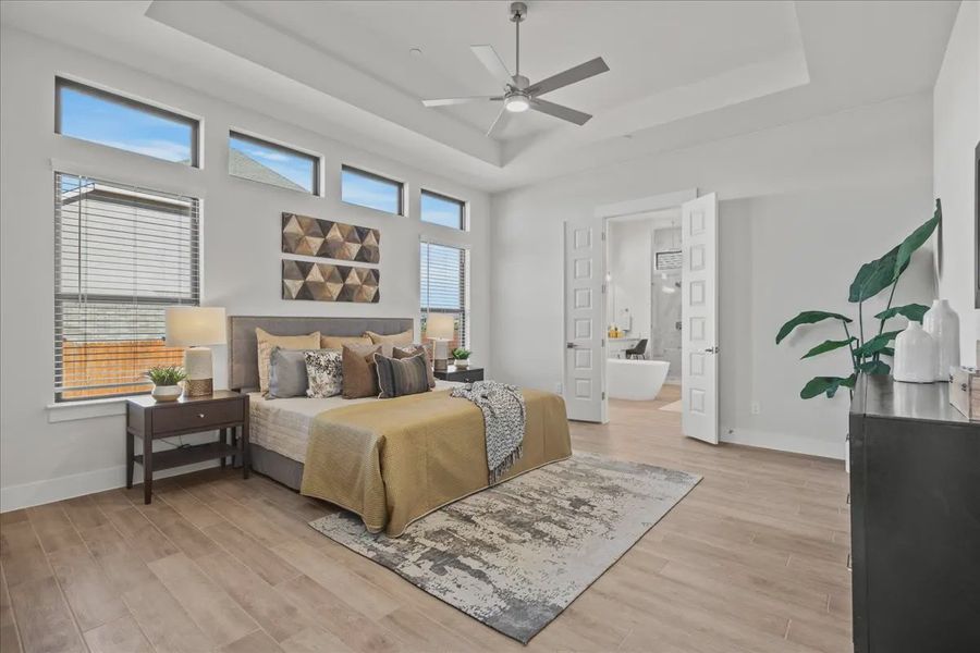 Representative furnished interior of a home built from the Bradley by Chesmar Homes in Sweetwater, Austin (Image 12).