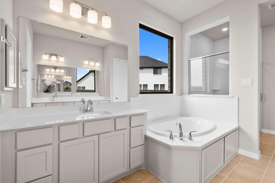Furnished interior view inside a new home in Bridgeland, Cypress (Image 13).