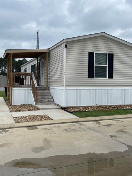 Exterior details and patio area of a home in , Tomball (Image 20).