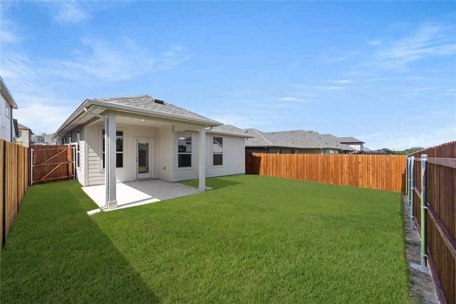Exterior details and patio area of a home in Keeneland, Aubrey (Image 21). Exterior details and patio area of a home in Keeneland, Aubrey (Image 21).