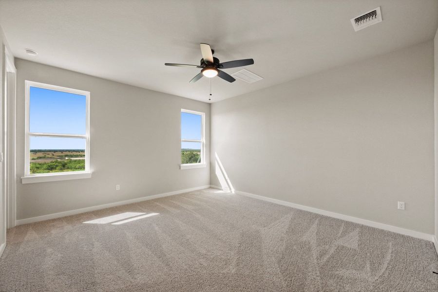 Spacious, unfurnished interior of a new home in Terrace Collection At Turner's Crossing, Buda (Image 34).