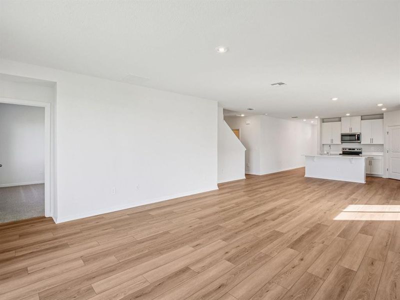 Spacious, unfurnished interior of a new home in The Grove at Stuart Crossing - Classic Series, Bartow (Image 21).