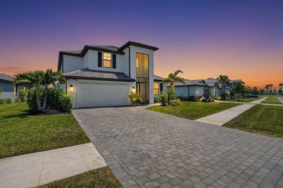 Front exterior of a new home in , Venice, FL, highlighting curb appeal (Image 24). Front exterior of a new home in , Venice, FL, highlighting curb appeal (Image 24).
