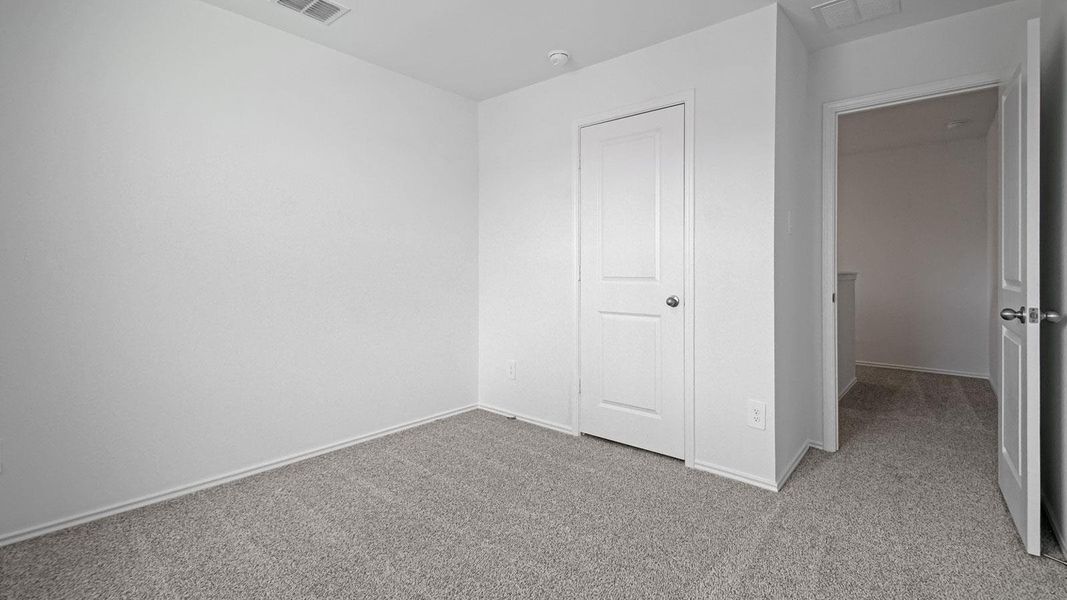 Spacious, unfurnished interior of a new home in Prairie Lakes, Buda (Image 24).