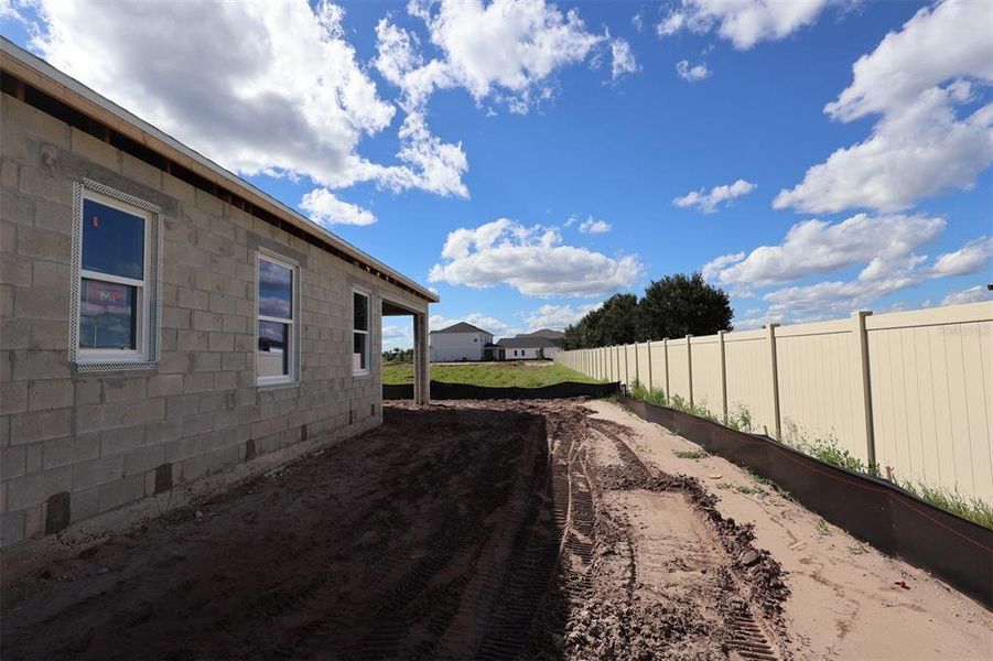 Exterior details and patio area of a home in Bay Lake Farms, St. Cloud (Image 2).