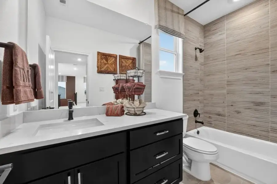 Representative furnished interior of a home built from the Balcones by Taylor Morrison in Eastwood, Manor (Image 17).
