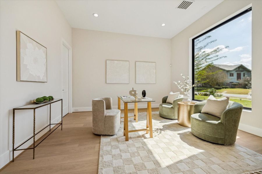 Designed as a peaceful retreat, the private study is enclosed by sliding glass doors for privacy while overlooking the landscaped front yard. Bright and inviting, it’s an ideal space for productivity or quiet relaxation. Designed as a peaceful retreat, the private study is enclosed by sliding glass doors for privacy while overlooking the landscaped front yard. Bright and inviting, it’s an ideal space for productivity or quiet relaxation.