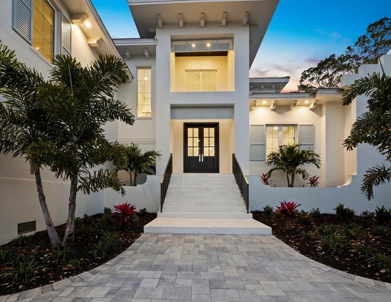 Front exterior of a new home in , Sarasota, FL, highlighting curb appeal (Image 24).