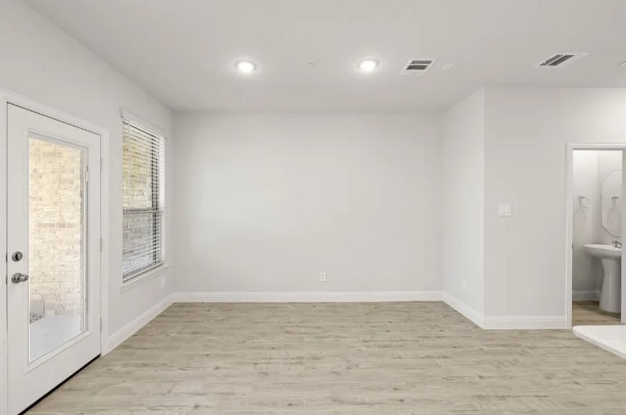 Front exterior of a new home in Sereno Oaks at Buckner Terrace, Dallas, TX, highlighting curb appeal (Image 8).