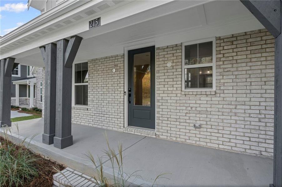 Exterior details and patio area of a home in Twin Lakes, Hoschton (Image 25).