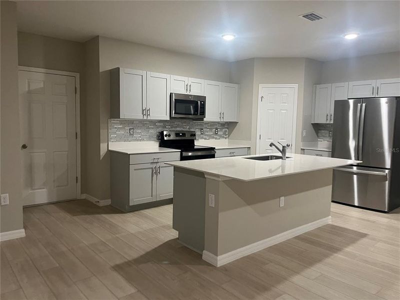 Furnished interior view inside a new home in Pasadena Point, Wesley Chapel (Image 7).