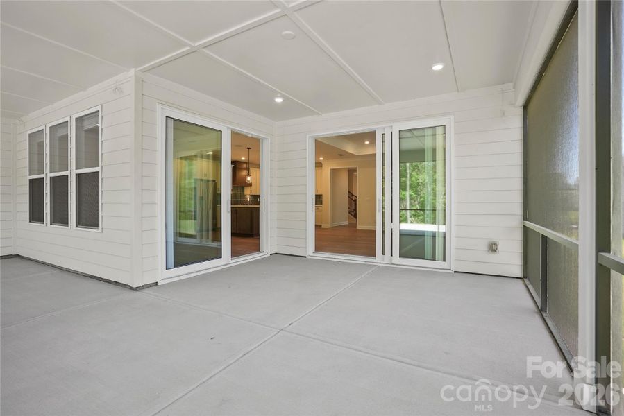 Exterior details and patio area of a home in Carolina Riverside, Belmont (Image 29).
