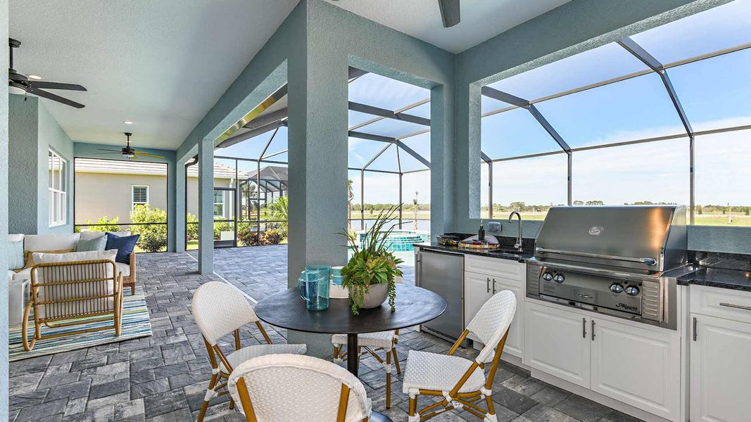 Exterior details and patio area of a home in SkySail Real Estate and Homes for Sale in Naples, FL - Neal Communities, Naples (Image 4). Exterior details and patio area of a home in SkySail Real Estate and Homes for Sale in Naples, FL - Neal Communities, Naples (Image 4).
