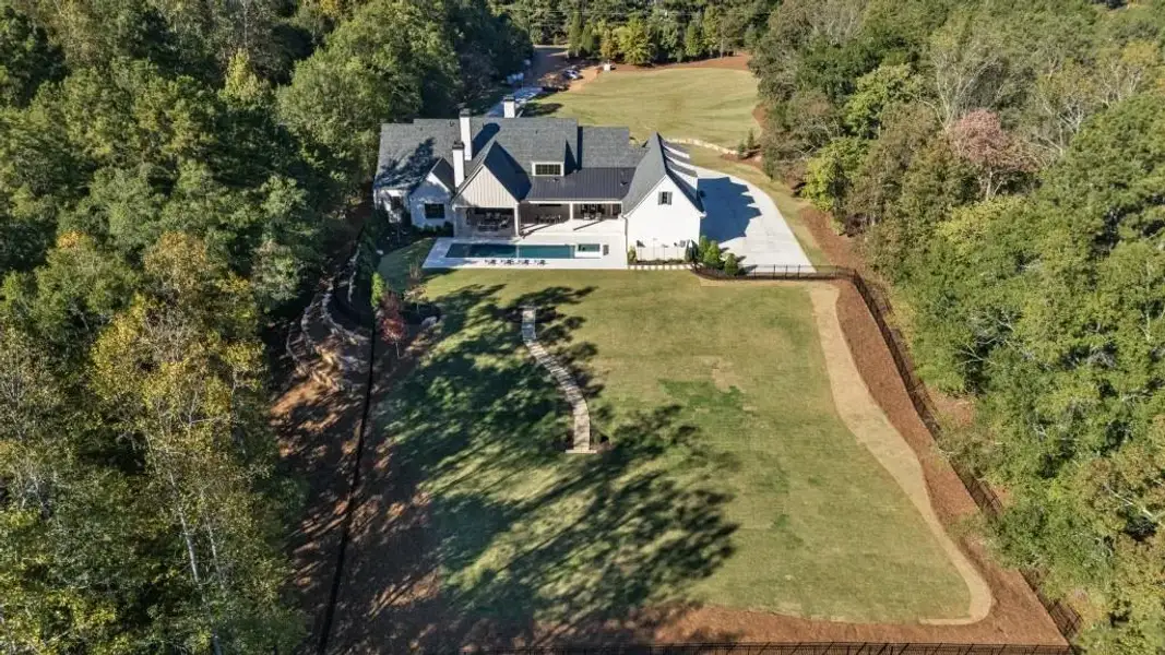 Front exterior of a new home in , Milton, GA, highlighting curb appeal (Image 25).