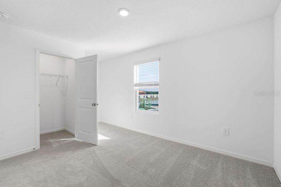 Spacious, unfurnished interior of a new home in The Towns at Firethorn, Parrish (Image 21).