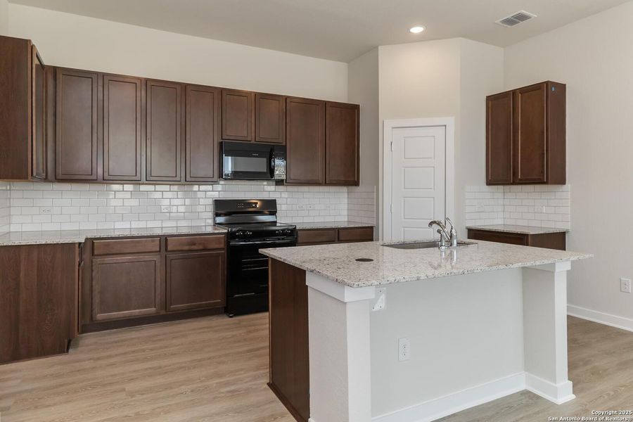 Furnished interior view inside a new home in Applewhite Meadows, San Antonio (Image 6). Furnished interior view inside a new home in Applewhite Meadows, San Antonio (Image 6).