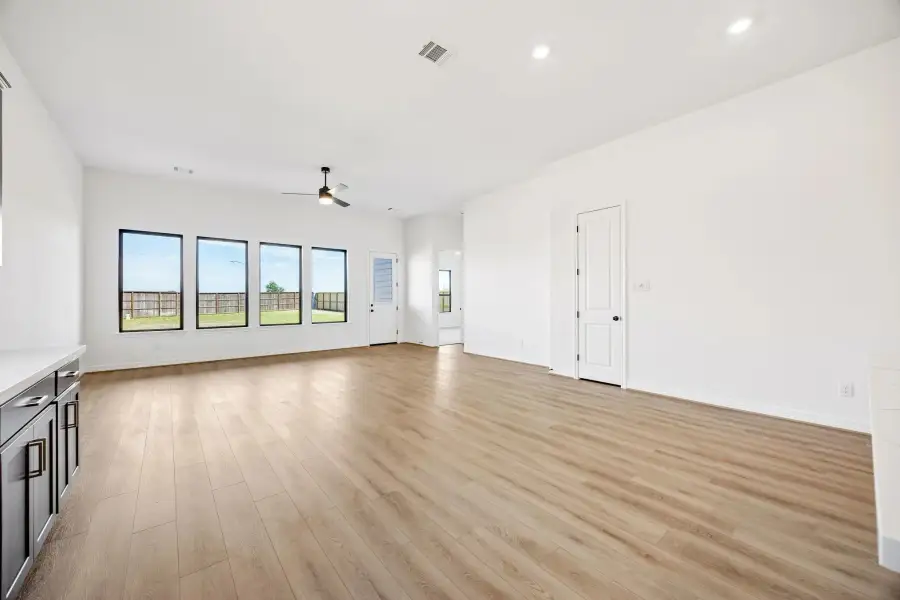 Gathering room.Sample product photo. Actual exterior and interior selections may vary by homesite. Photo may be virtually staged.