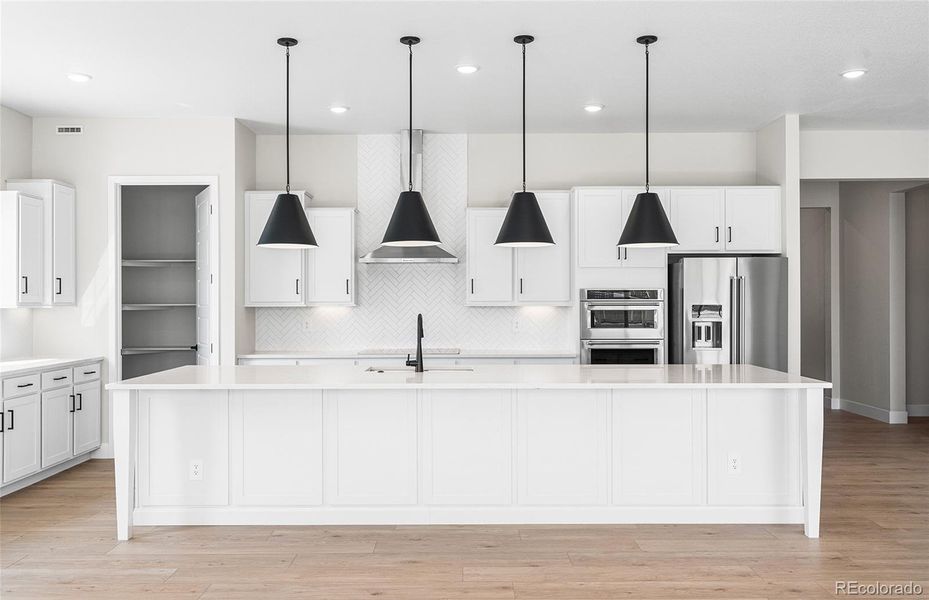 Furnished interior view inside a new home in Hilltop at Inspiration, Aurora (Image 19).
