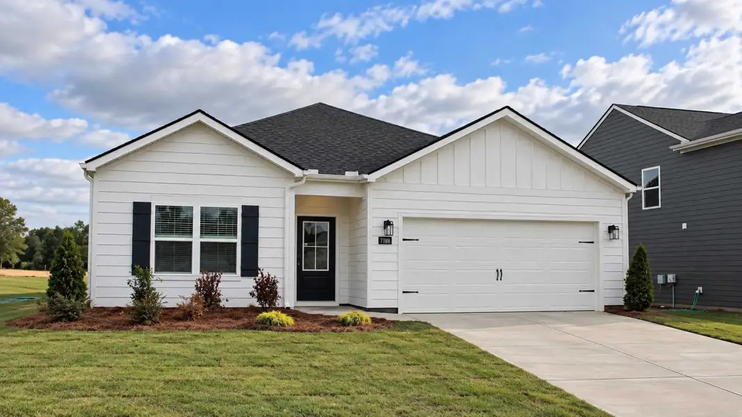 Front exterior of a new home in The Hideaway at Edgestone, Ooltewah, TN, highlighting curb appeal (Image 2).