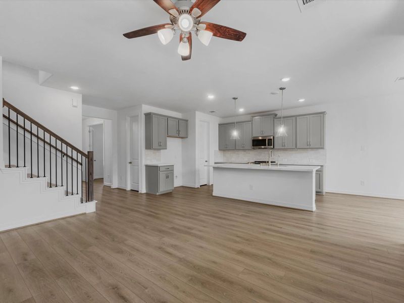 Gathering room. Sample product photo. Actual exterior and interior selections may vary by homesite. Photo may be virtually staged.