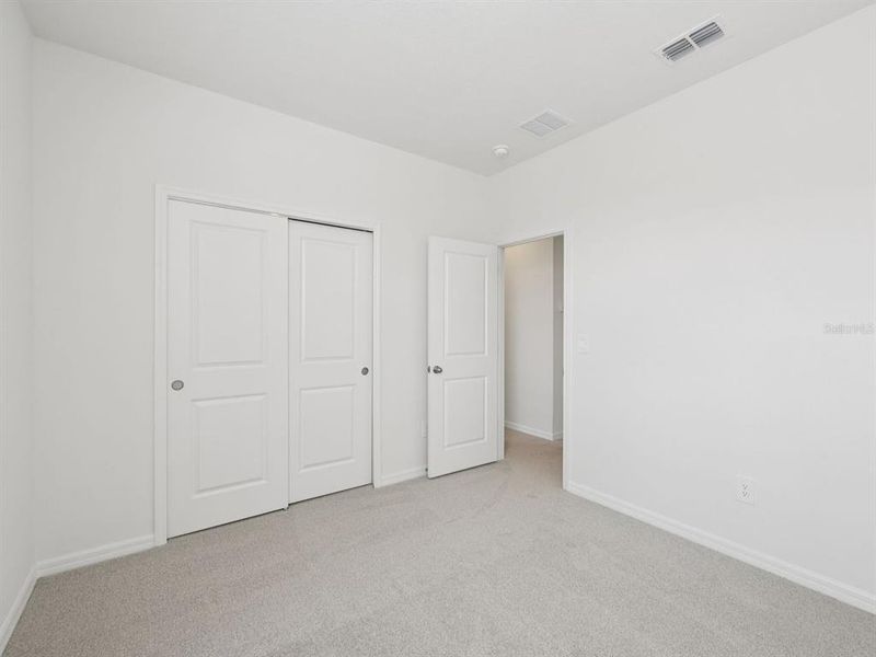 Spacious, unfurnished interior of a new home in Coasterra - Reserve Series, Palmetto (Image 10).