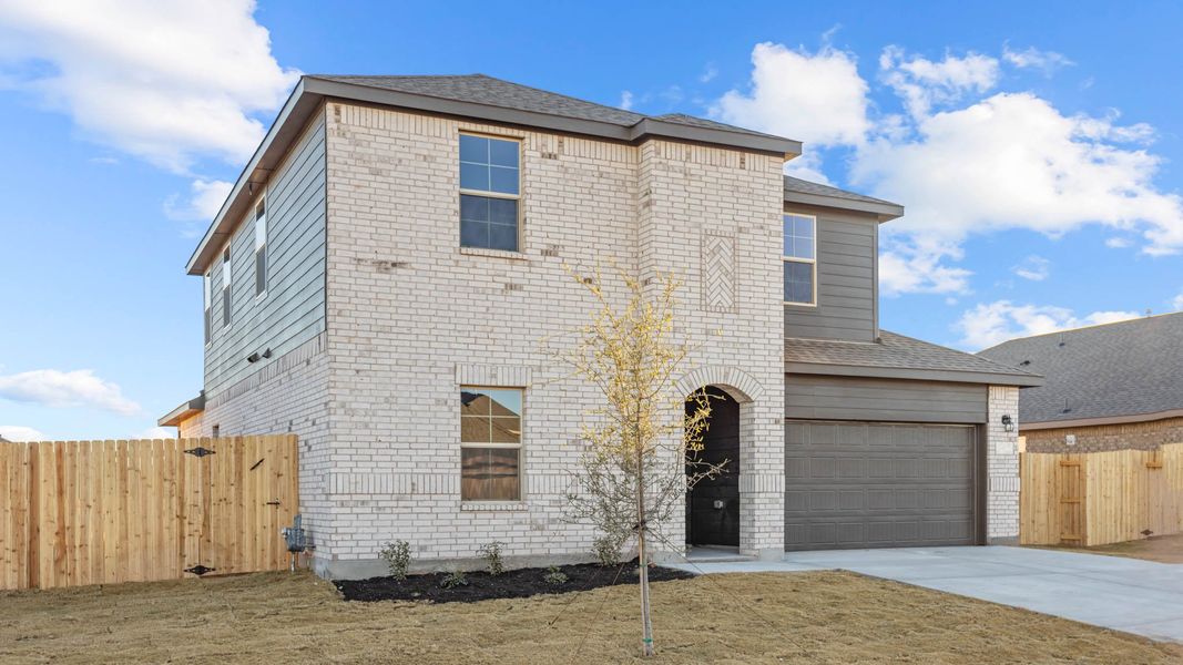 Representative exterior photo of a completed home built from the ROSEMONT by D.R. Horton in Homestead at Parks Bell Ranch, Odessa, TX (Image 5).