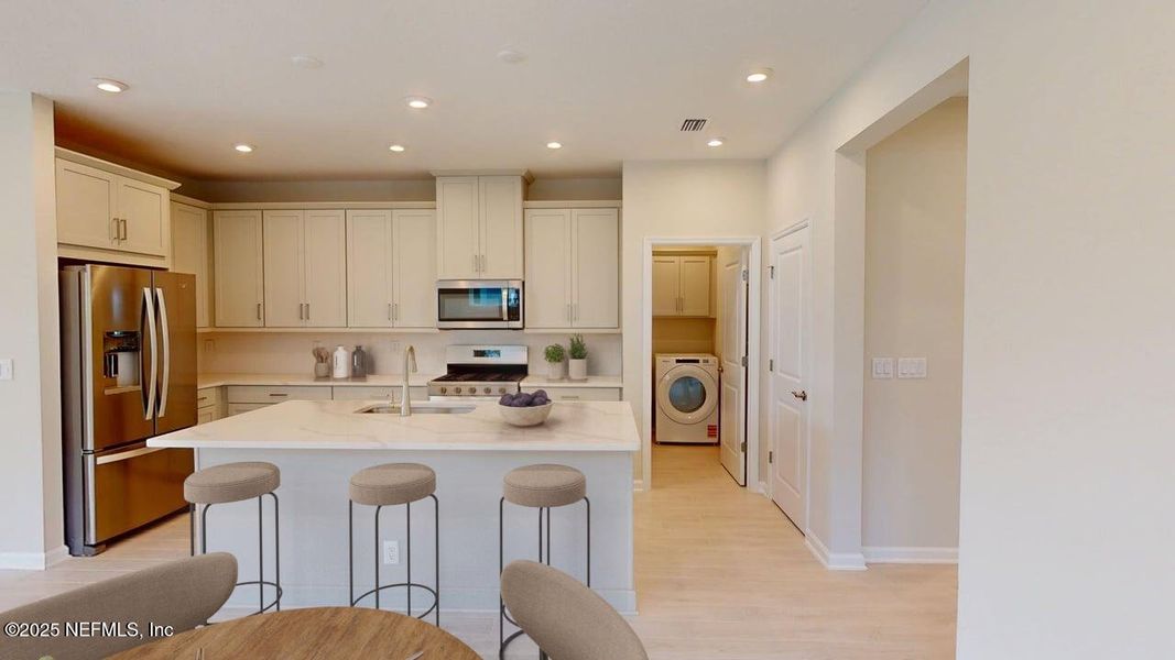 Furnished interior view inside a new home in RiverTown - WaterSong, St. Johns (Image 7).