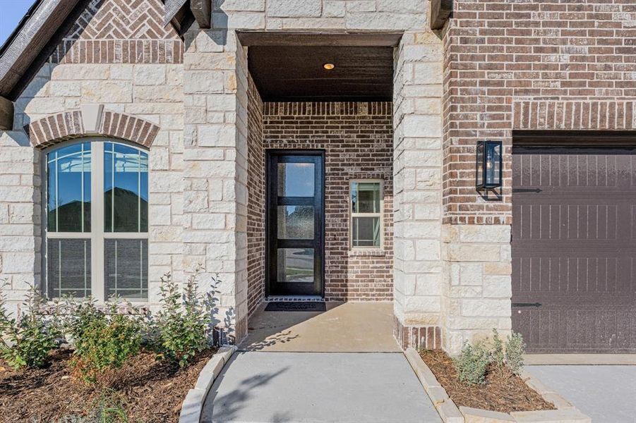 Exterior details and patio area of a home in Coyote Crossing, Godley (Image 3).