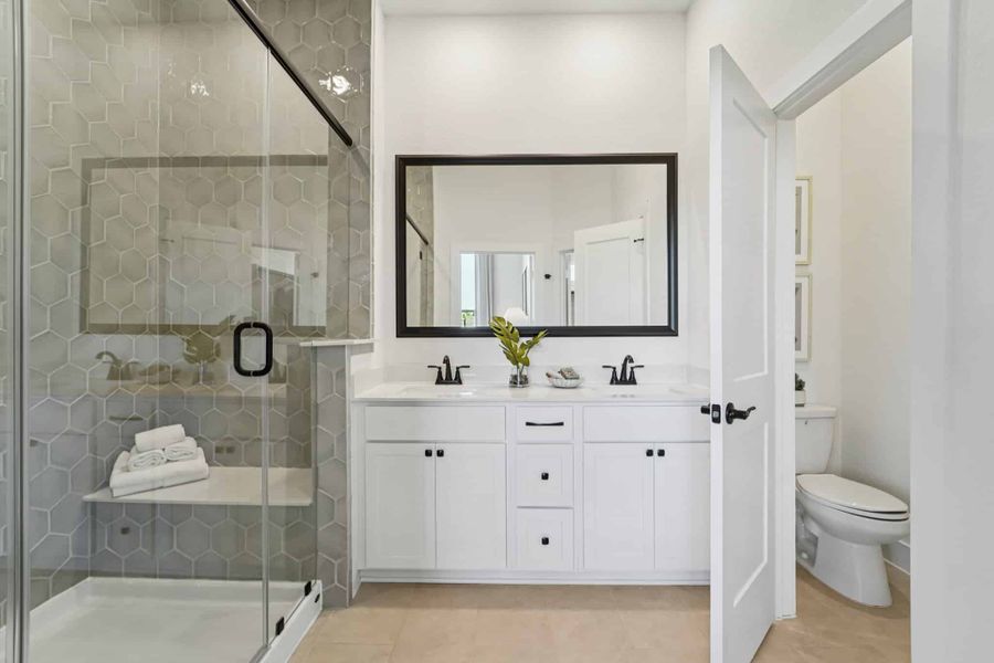 Furnished interior view inside a new home in Bridgeland, Cypress (Image 10).