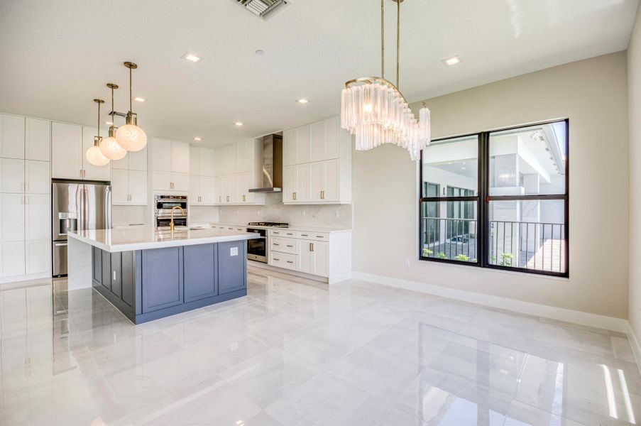 Furnished interior view inside a new home in Apex at Avenir, Palm Beach Gardens (Image 38).