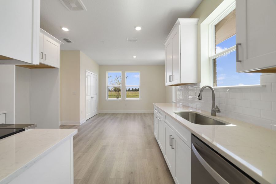 Furnished interior view inside a new home in Gatherings® of Lake Nona, Orlando (Image 6).